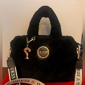 GUESS Black Faux Fur Satchel with Gold Logo & Branded Strap